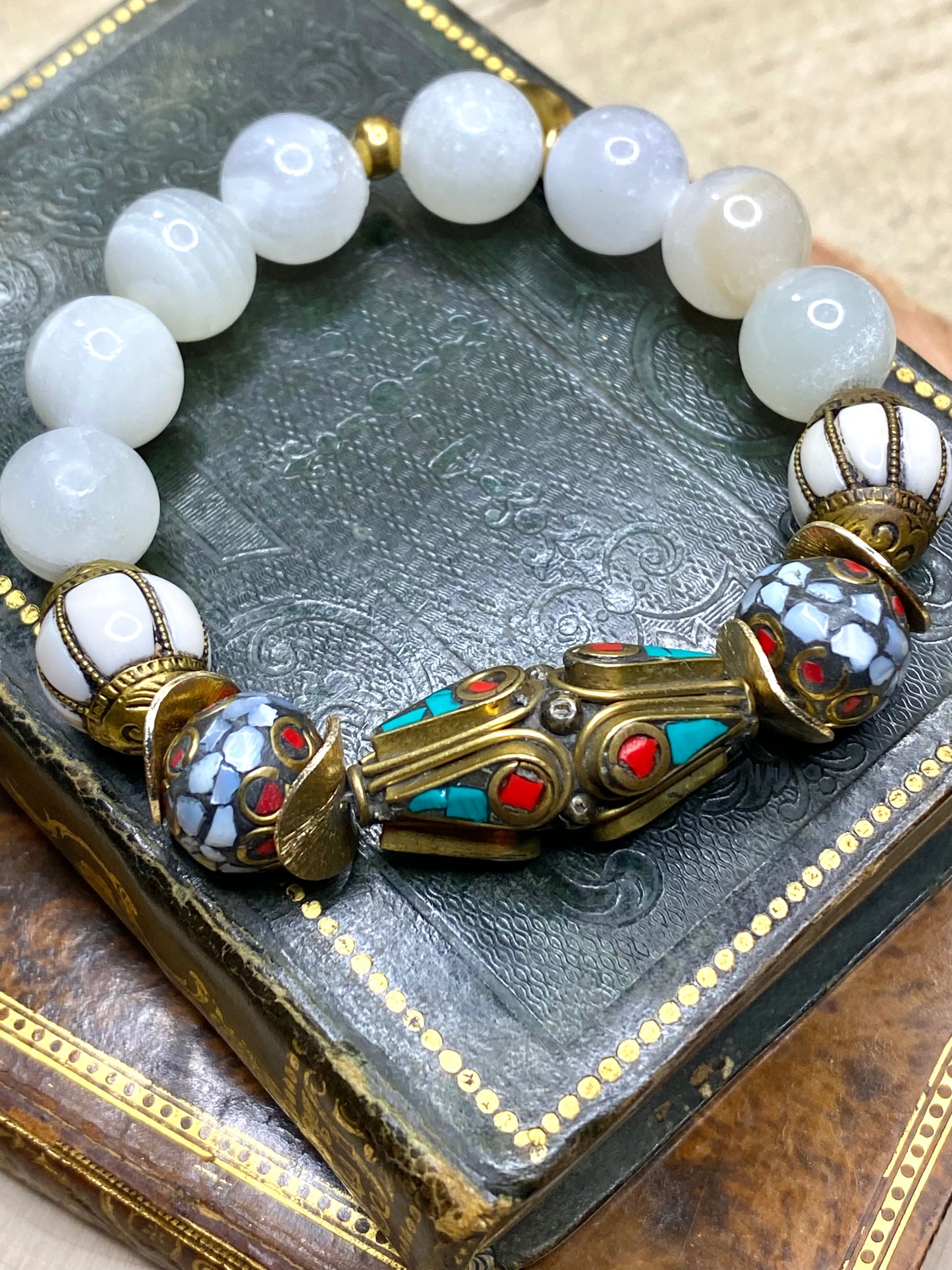 Tibetan bead bracelet with turquoise, red coral, mother of pearl inlays
