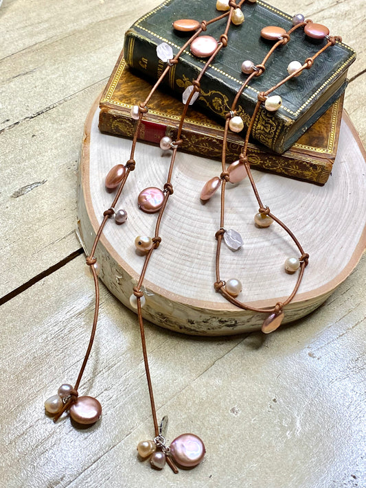 Stasha Soulstring of coin pearls and rose quartz on light brown lariat necklace