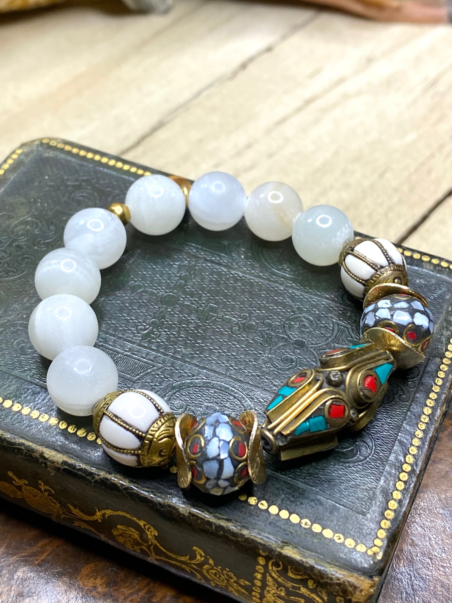 Tibetan bead bracelet with turquoise, red coral, mother of pearl inlays