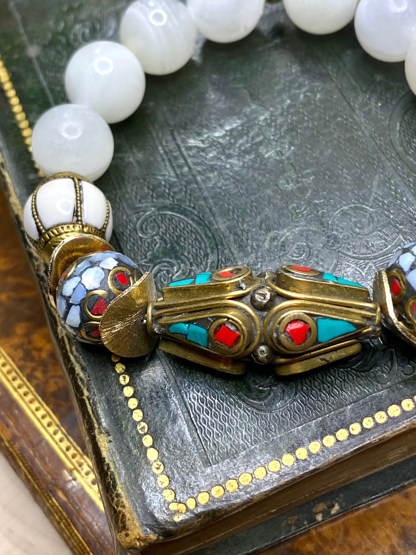 Tibetan bead bracelet with turquoise, red coral, mother of pearl inlays